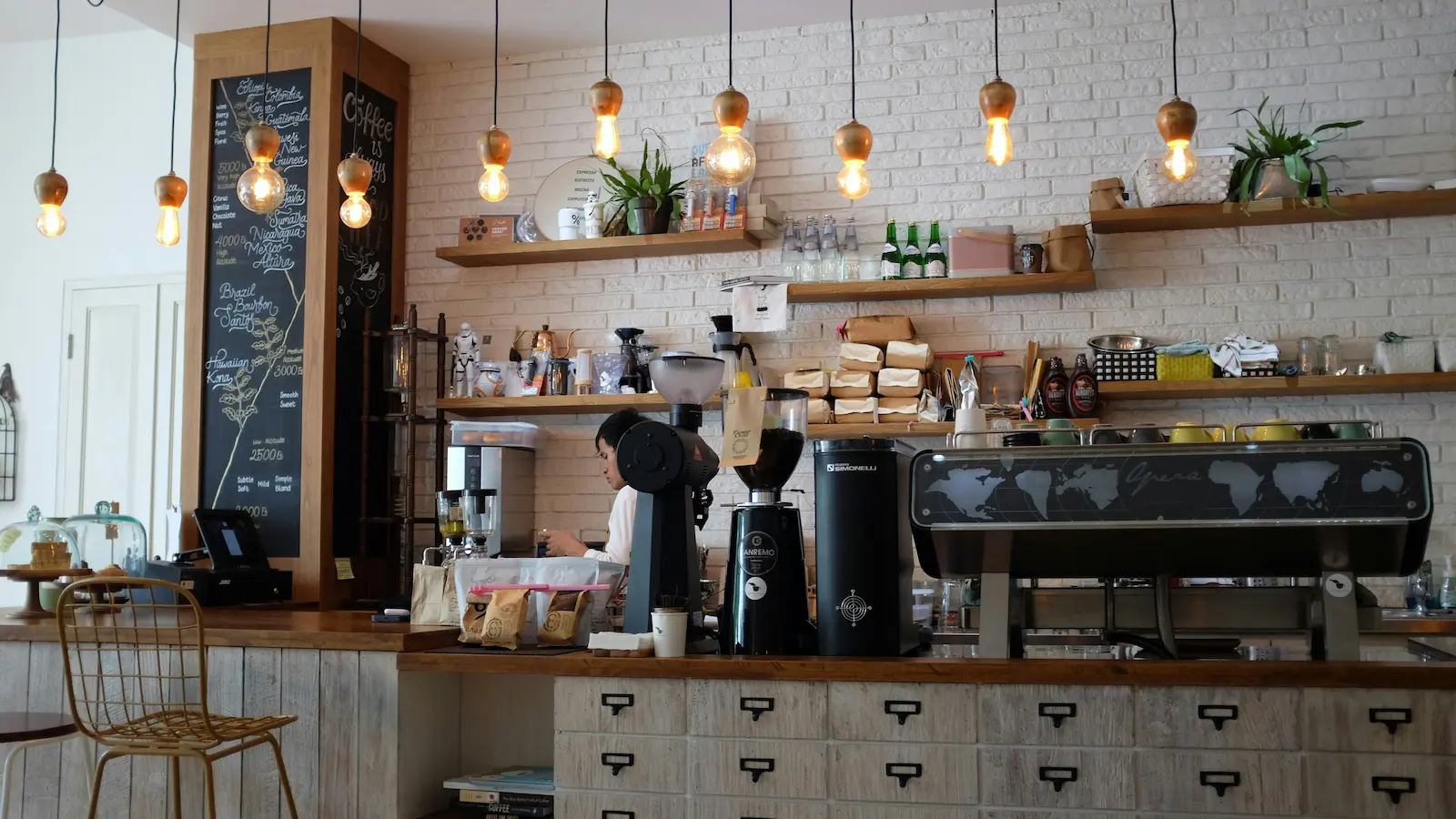 Commercial coffee machine, grinders and cafe counter