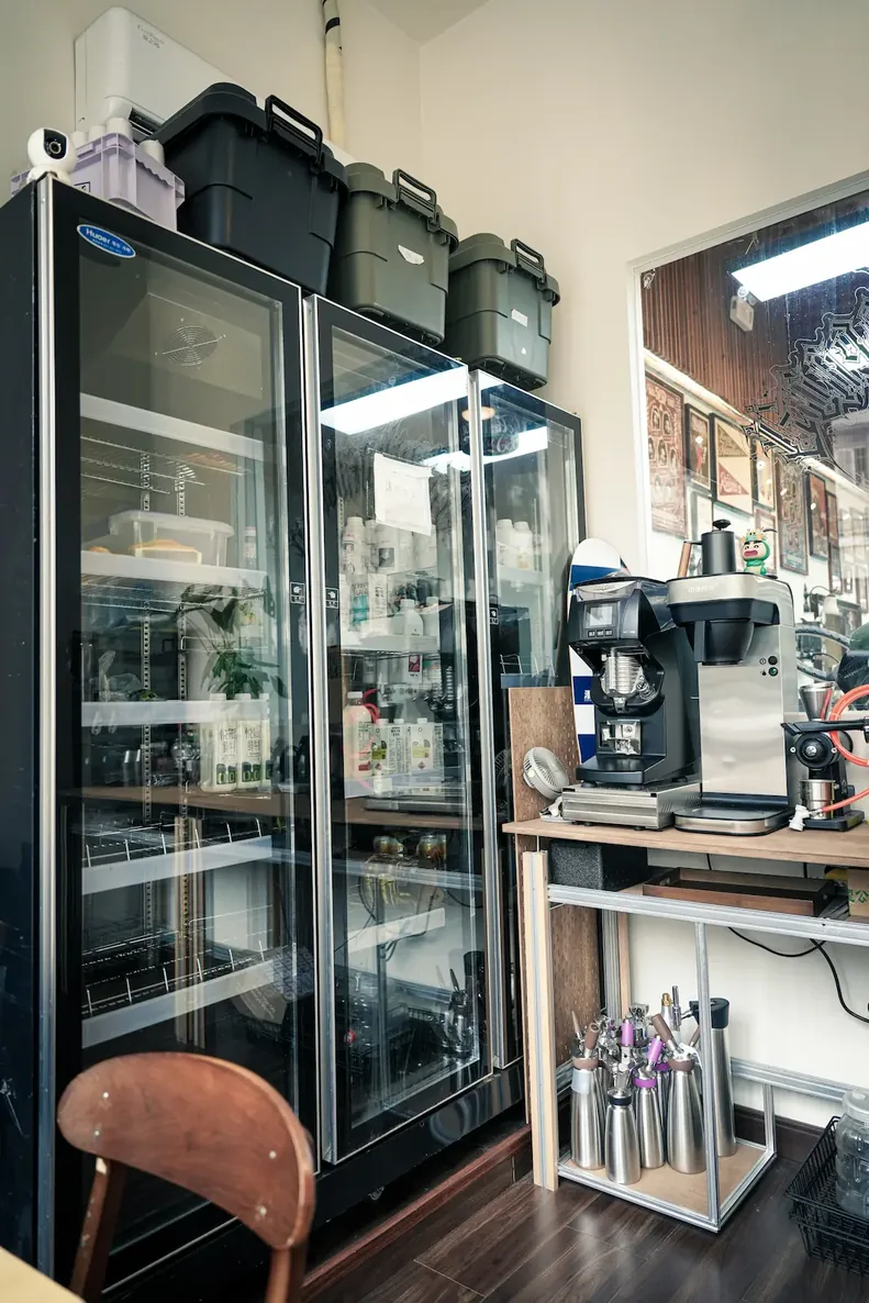Under counter refrigeration in a cafe service area