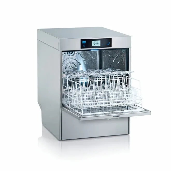 Commercial dishwasher in a busy kitchen