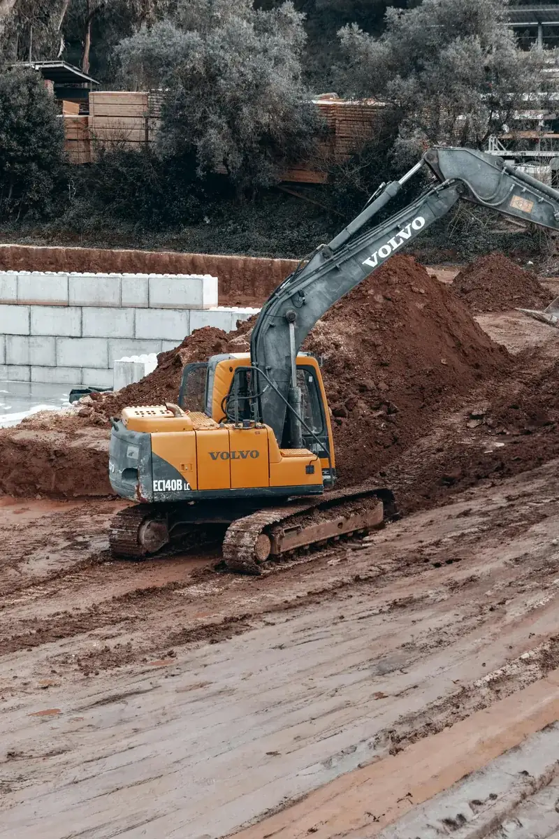 Mini digger on a construction site